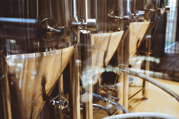 Metal tanks for beer production brewery.